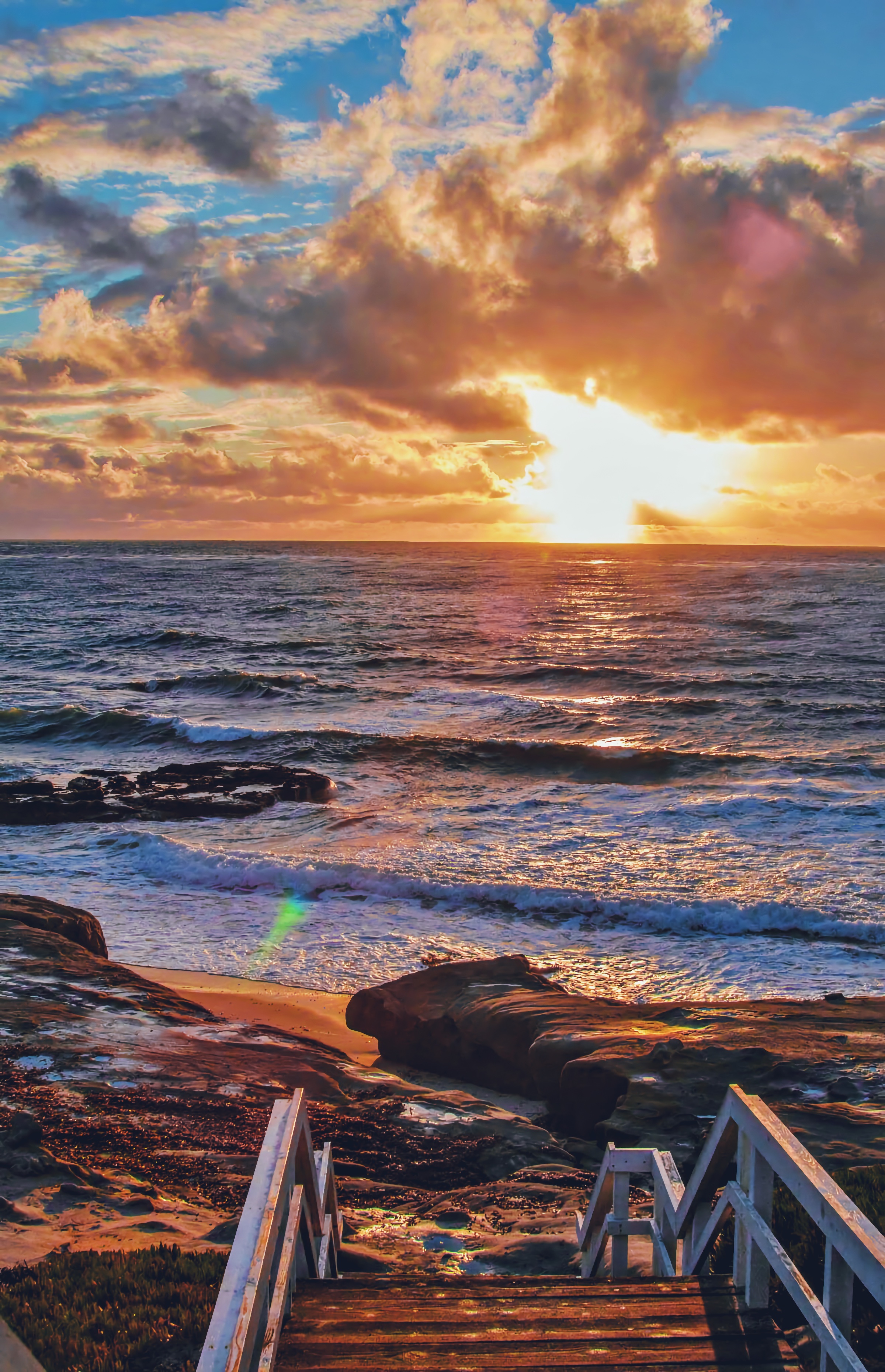 Coastal stairway above the Pacific at dusk